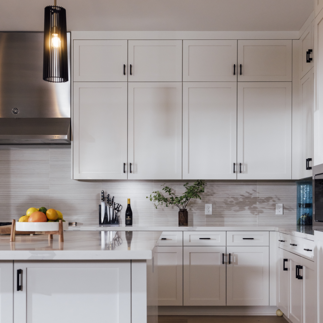 White kitchen cabinetry + range