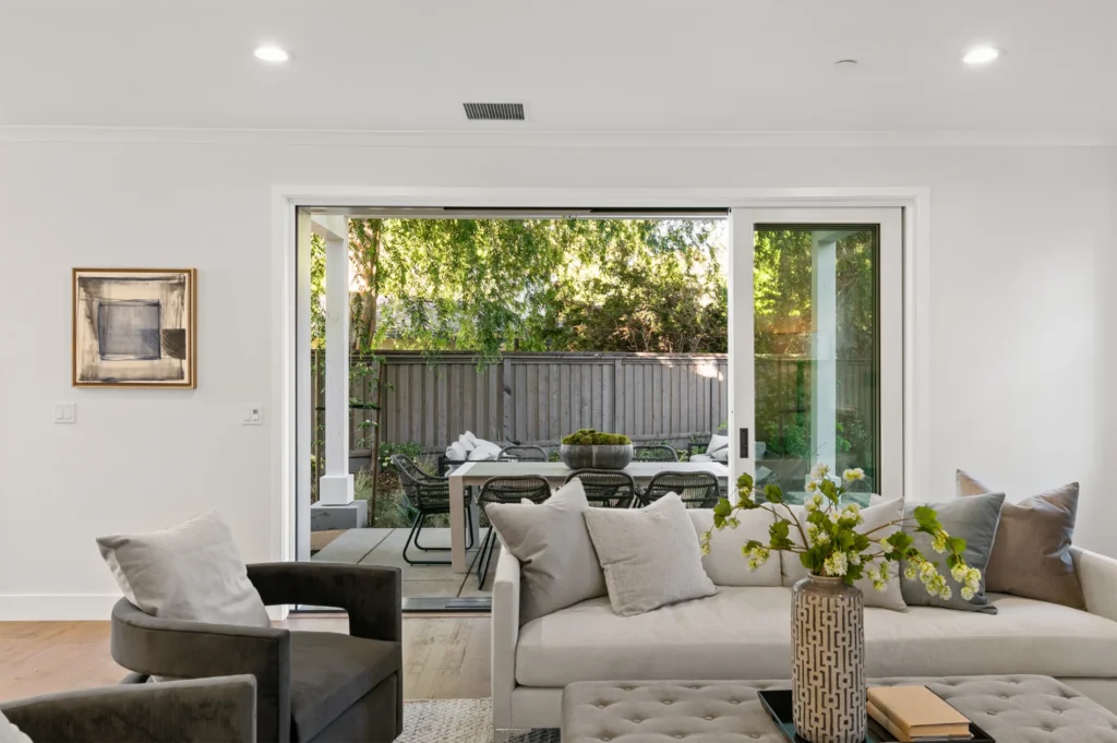 Menlo Park Traditional Home living room with large sliding doors to patio