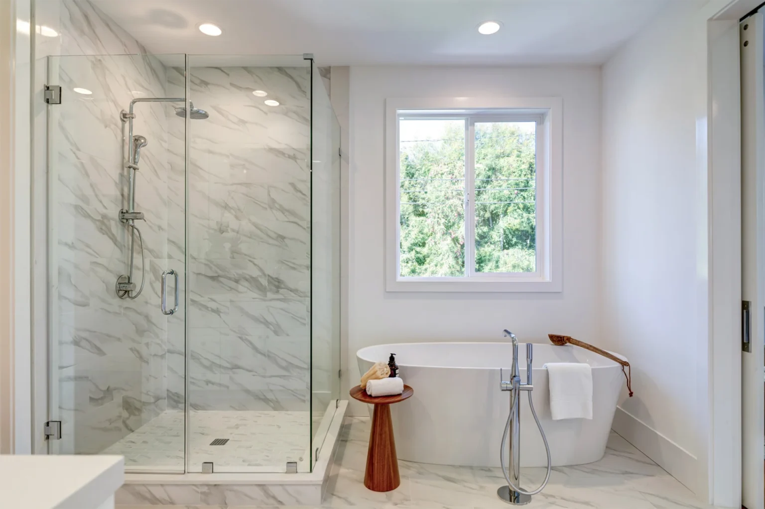 Hollywood custom home master bathroom with separate tub and shower