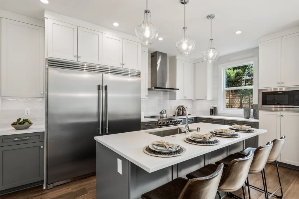 Seattle Traditional Style Home kitchen with island and double fridge