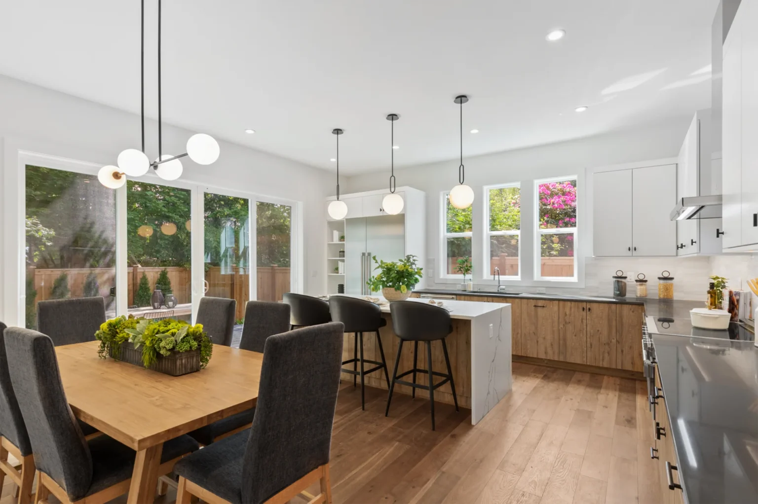 Seattle Transitional Style Home Interior Dining Area and Kitchen Island