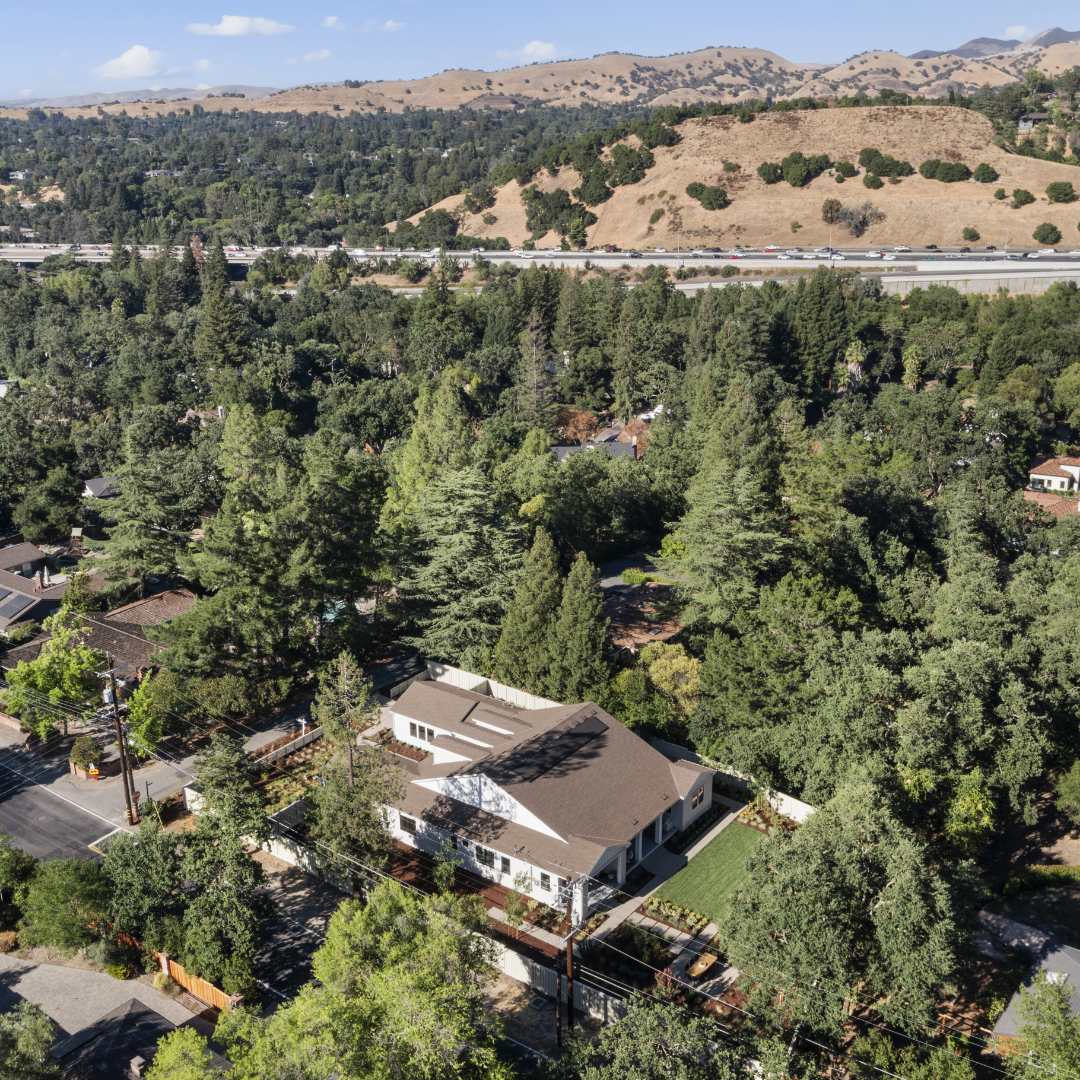 Aerial image of TJH home amongst the trees in suburban Northern California neighborhood