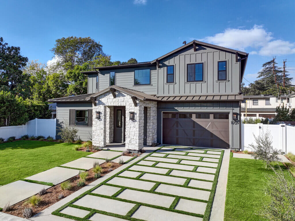 TJH Willow exterior in Southern California featuring a landscaped backyard with Southern California planting.