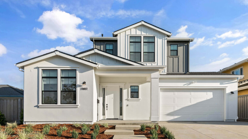 TJH Hackberry two-story exterior in Northern California with white siding, large windows, double garage, and landscaped front yard