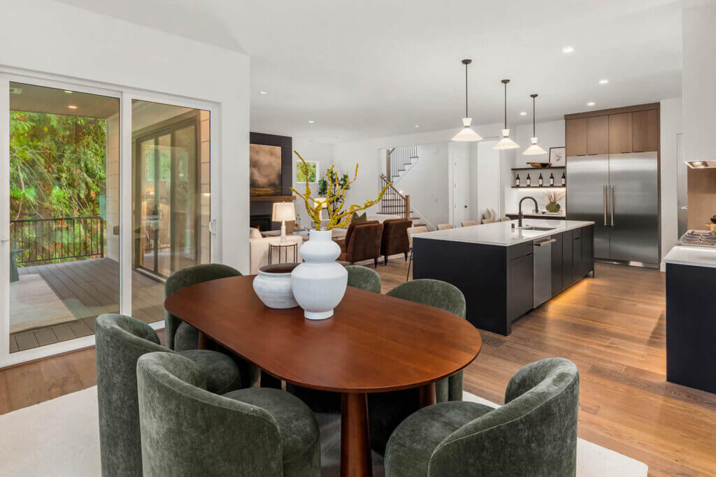 TJH Sawyer kitchen in the Pacific Northwest featuring stainless steel appliances and a bright, modern aesthetic.