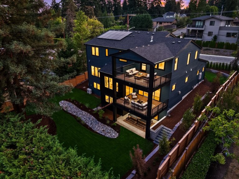 Modern new construction home in Bellevue Washington with landscaped backyard