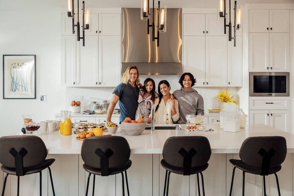 TJH Southern California homeowners enjoying their kitchen, captured in a TJH home.