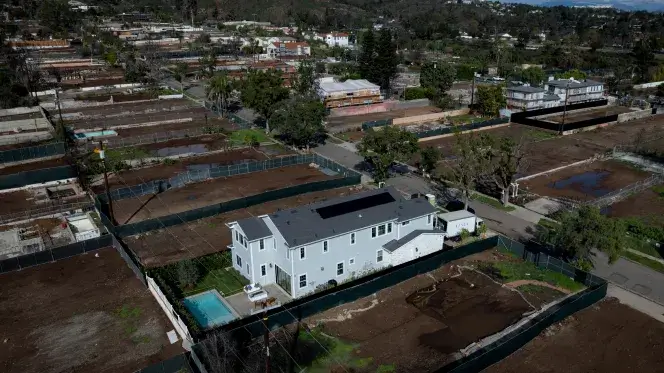 Pacific Palisades fire rebuild newly completed home showing early recovery progress after Los Angeles wildfire